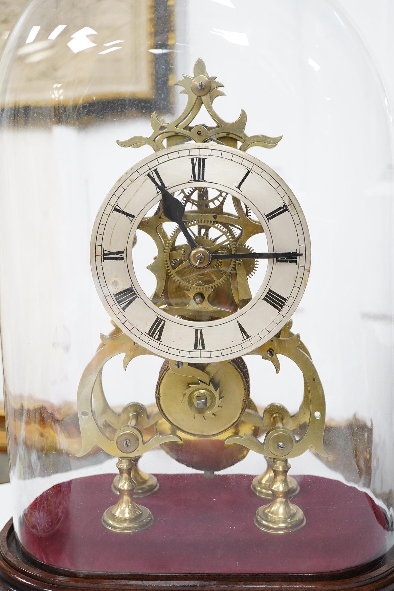 A 19th century skeleton timepiece under a dome, 41cm